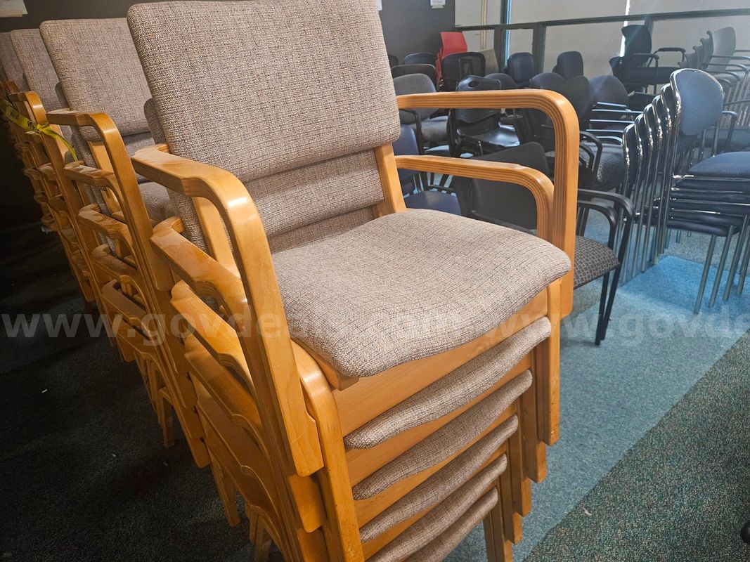 12 Tan Stackable Chairs - Used