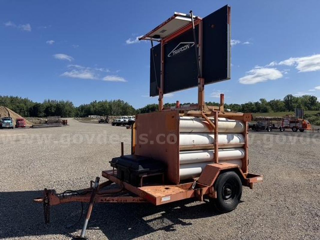Arrow board storage trailer with signs
