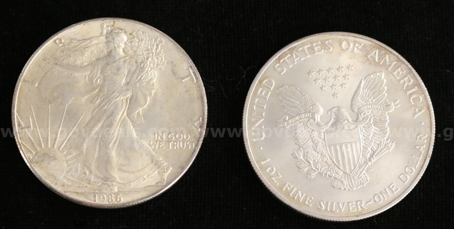 12 Assorted U.S. $1 Silver American Eagle Coins