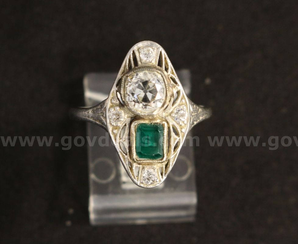 Platinum Euro Cut Diamond Ring With Emerald Cut Emerald Stone, 4.2 Grams