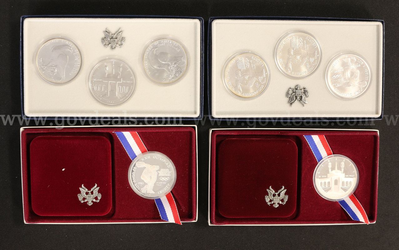 2- 1984 Silver Dollars & 2 Uncirculated 1983/ 84 Silver Dollar L.A. Olympic Sets