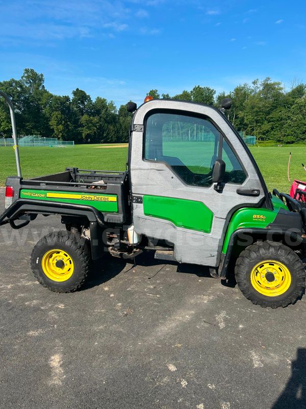 (1) John Deere Gator 855D with attachments Boss V Plow and Erskine Broom