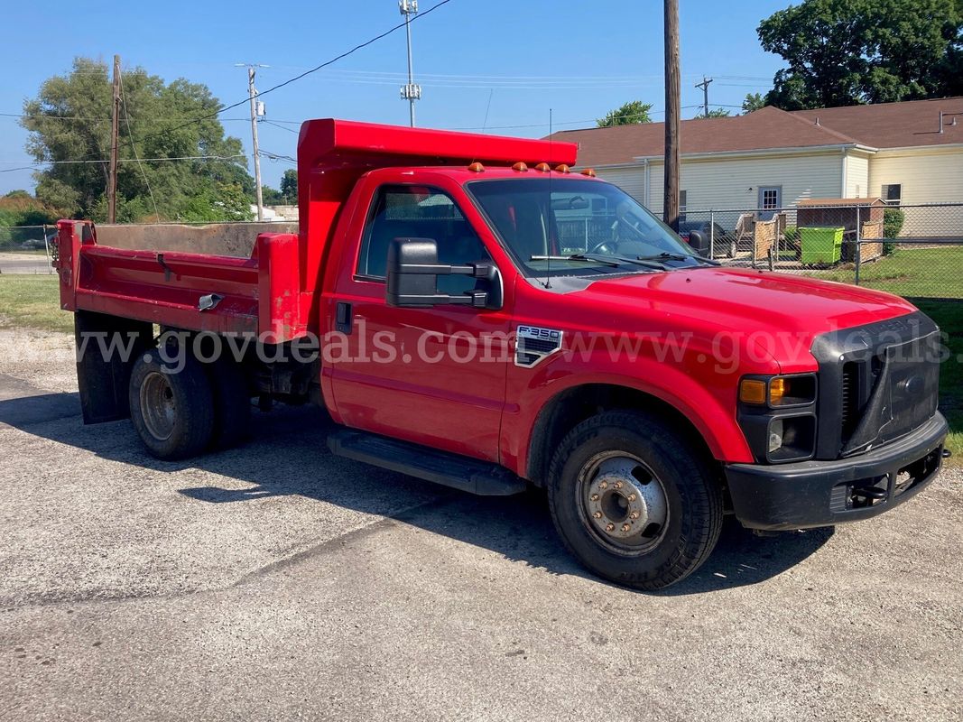 2008 Ford F-350 Super Duty with 9 foot Heil dump body. 5.4L V-8. 2WD. 205,243 miles.