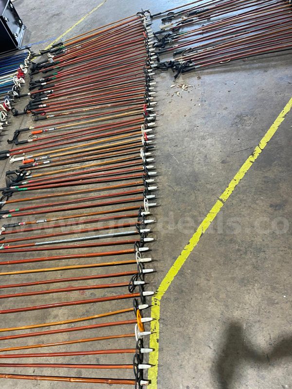 A Collection of 79 Wooden Cross-Country Ski Poles.