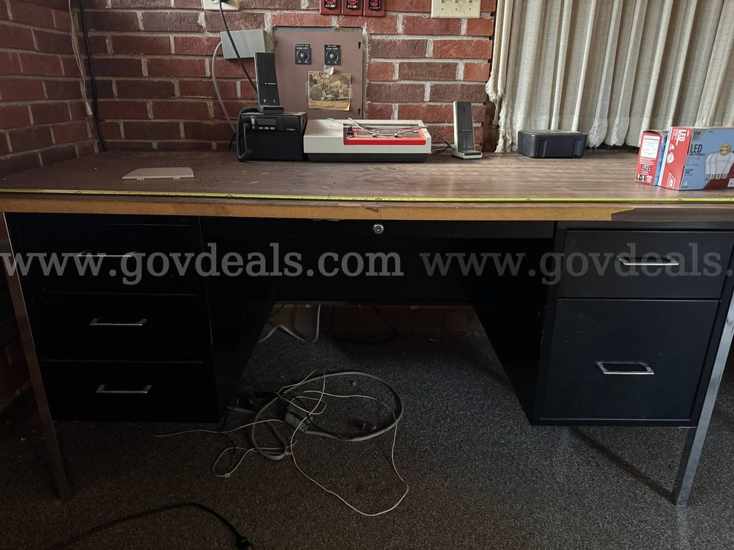 Office Desk, Steel, 6'x3'. Used, fair (dirty) condition. Wood-look laminate top. Black and chrome legs/drawers