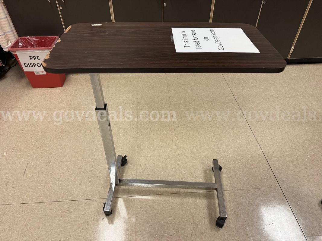 Overbed table with wheels