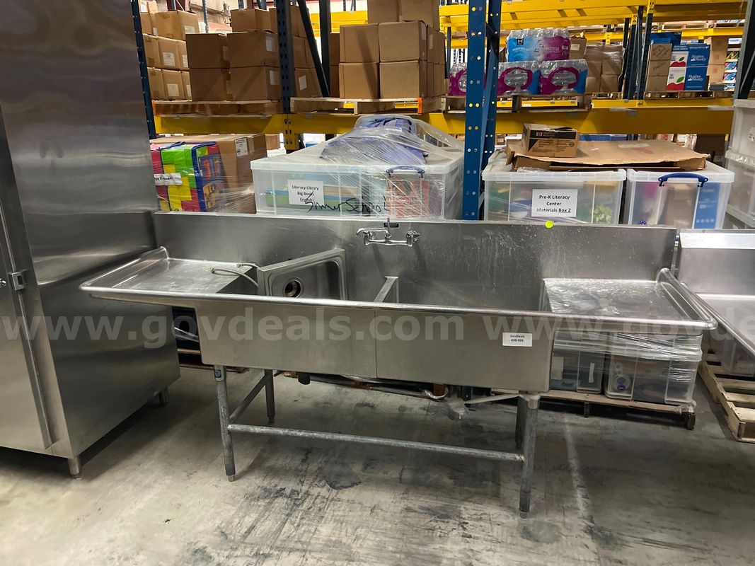 Two compartment sink, plus one small stainless hand sink