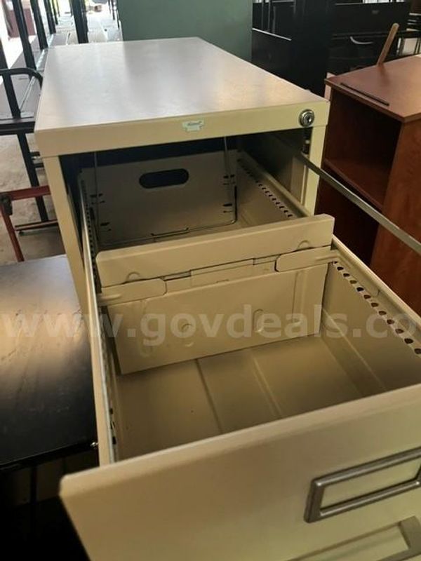 Three Metal Filing Cabinets