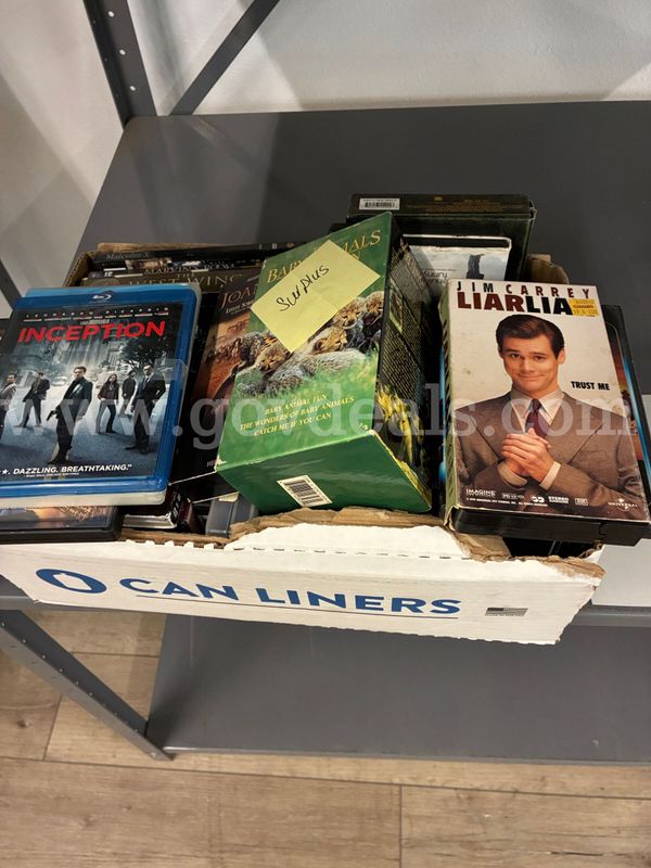 DVDs and VHS tapes, approximately 30  - UNTESTED