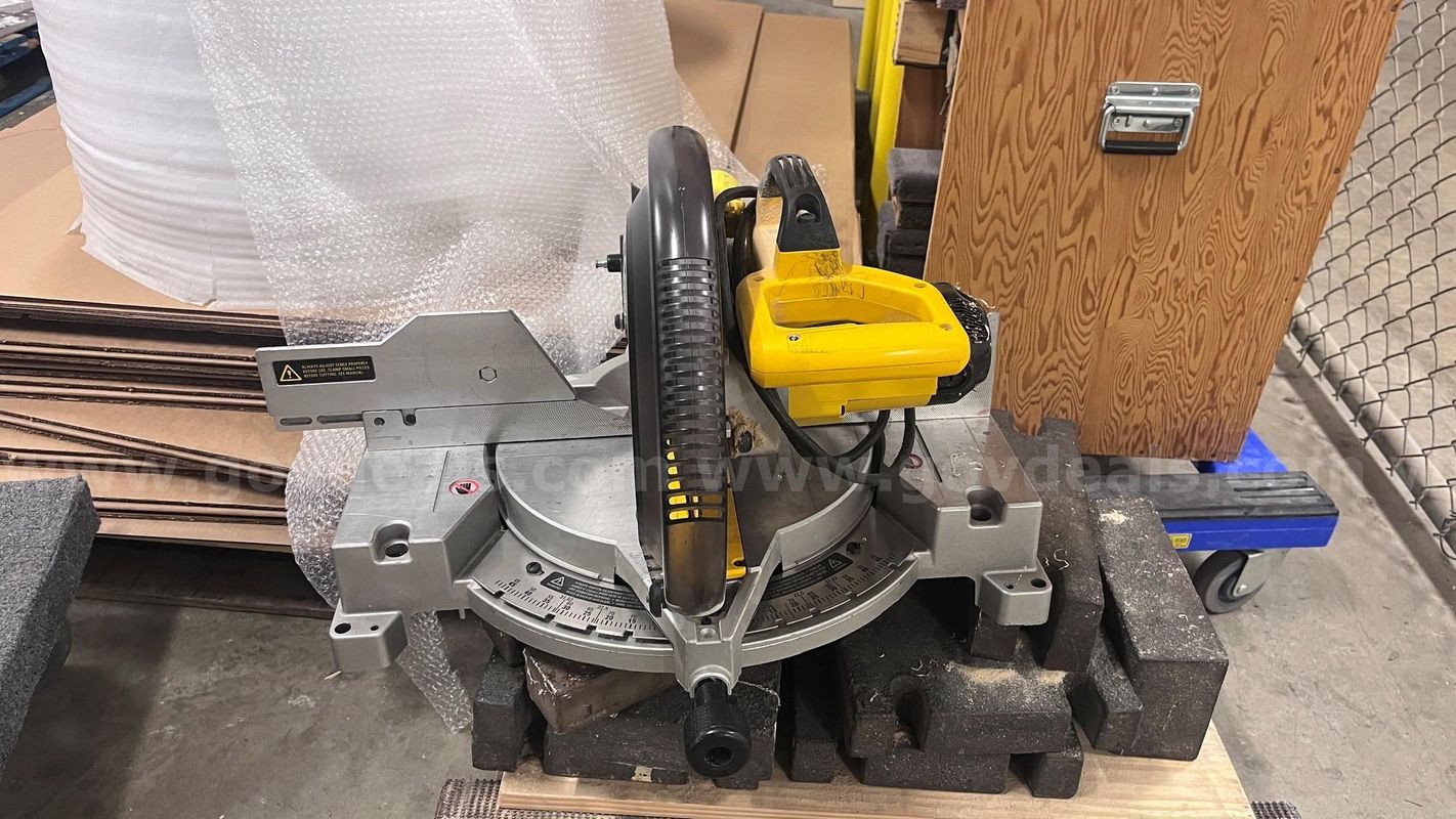 One Dewalt Compound Miter Saw
