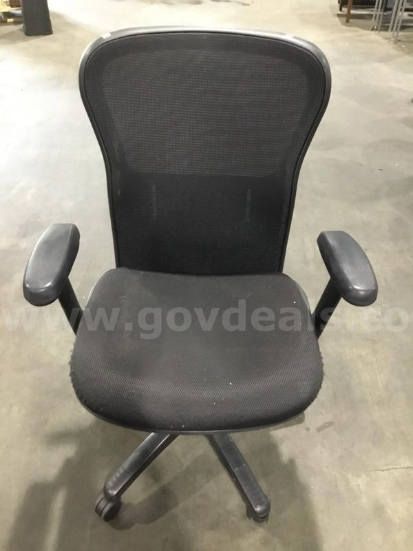 Black mesh office chair; with black padded armrests "DH"