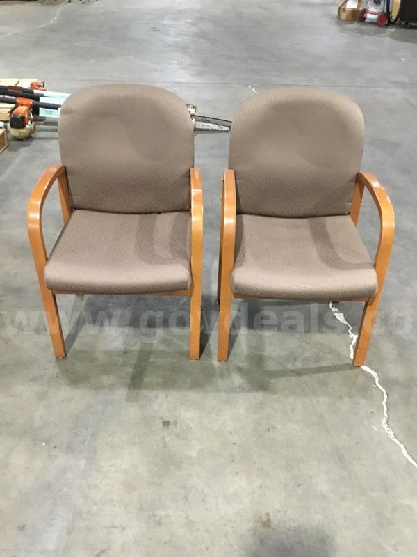 Two dark brown chairs; with dark brown hardwood armrests "DH"