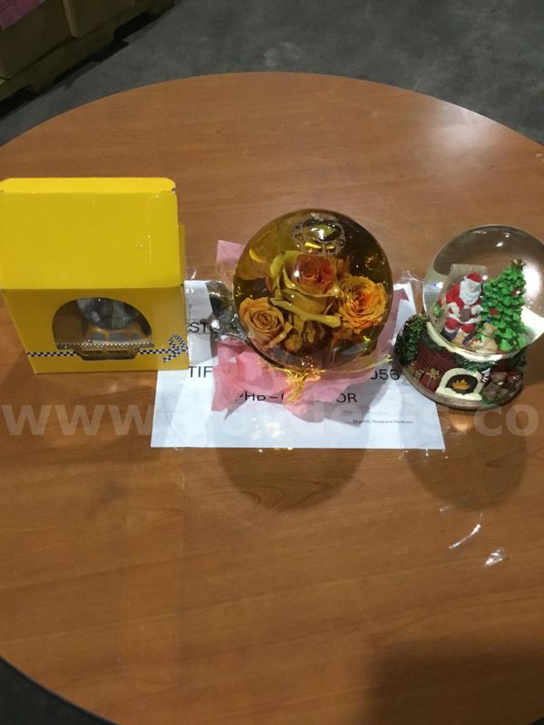 Lot of items-rose glitter globe, NY taxi globe, & a Santa Claus snow globe “DH”