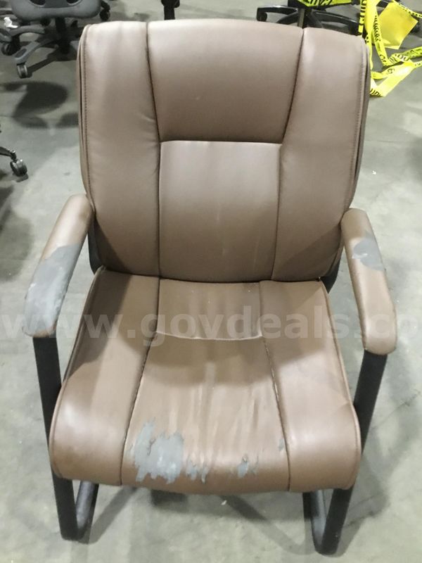 Chocolate brown leather sled chair; with matching brown armrests “DH”
