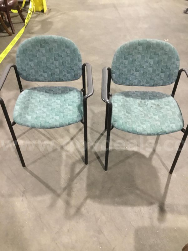 2 forest green chairs; with black padded armrests “DH”