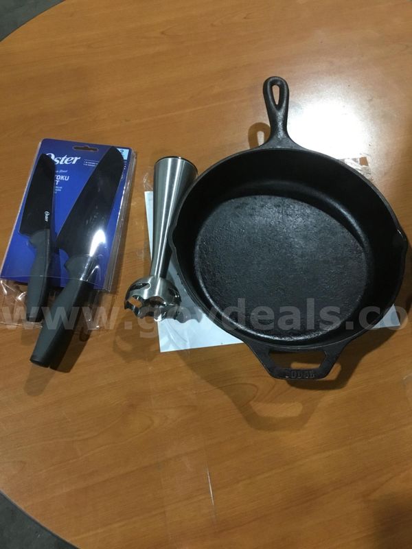 10 1/2 inch black Lodge pan, two Oster kitchen knives, an apple slicer “DH”