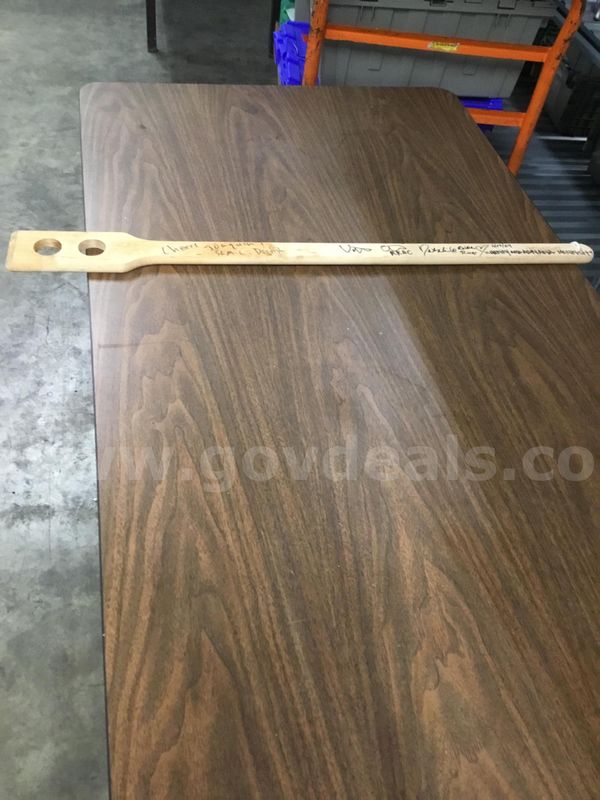 35 inch light oak paddle, with signatures of names written “DH”