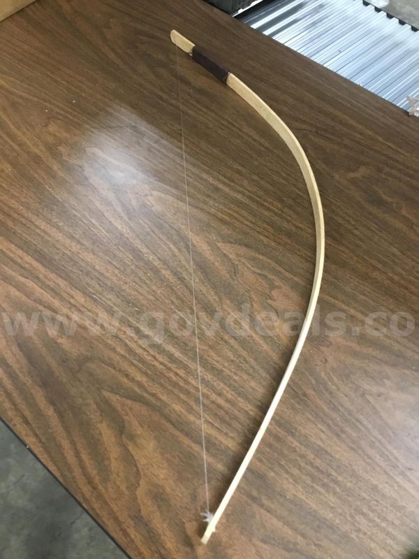 32 x 7 1/2 light oak wooden bow “DH”