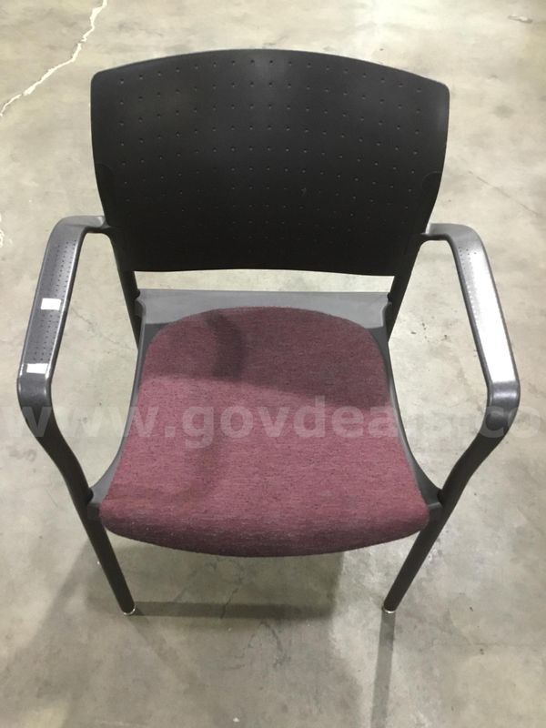 Black & burgundy chair; with black dotted padded armrests “DH”