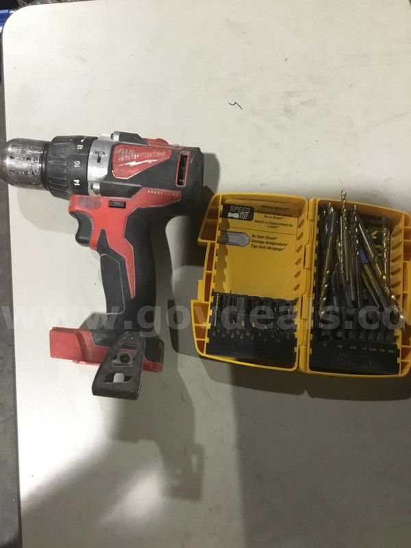 DeWalt drill bits, & a red & black Milwaukee drill gun (NO BATTERY INCLUDED) “DH”