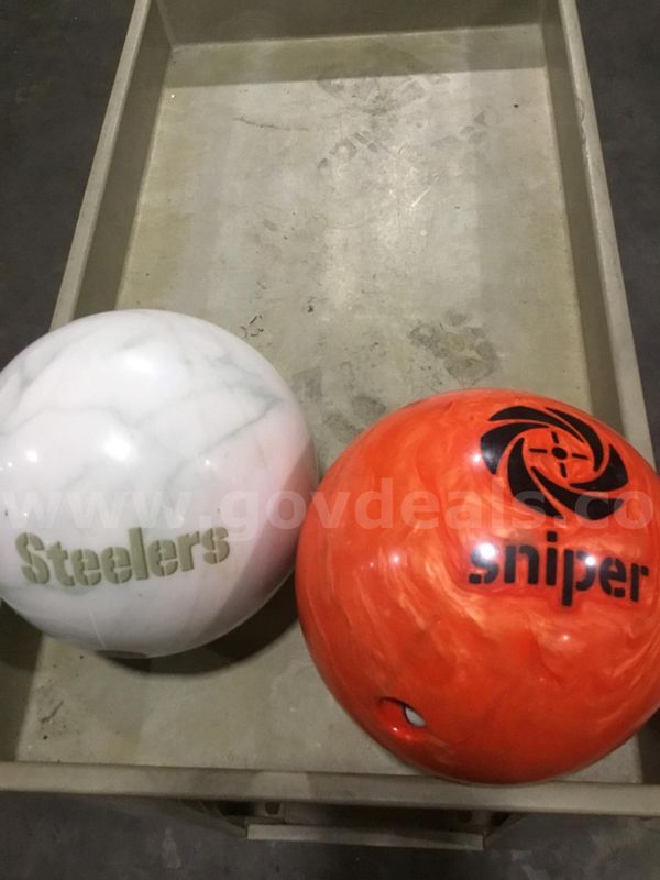 Orange Motiv bowling ball, & a granite Pittsburgh Steelers bowling ball “DH”