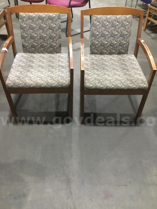 2 blue & gray chairs; with brown hardwood armrests “DH”