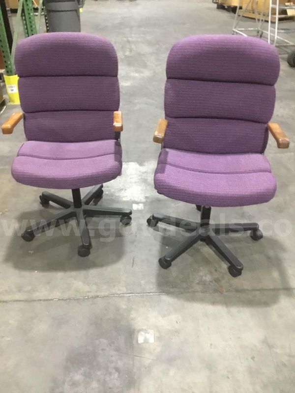 2 purple adjustable chairs; with brown hardwood armrests “DH”