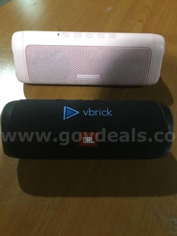 Pink Bolabutty speaker, & a black JBL speaker (BOTH TURN ON) “DH”