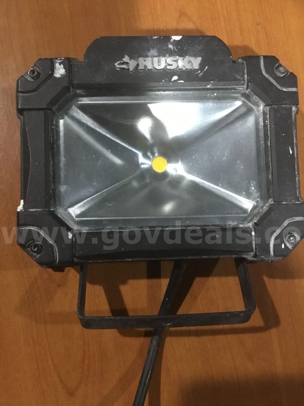 7 1/2 black head light (IT TURNS ON) "DH"