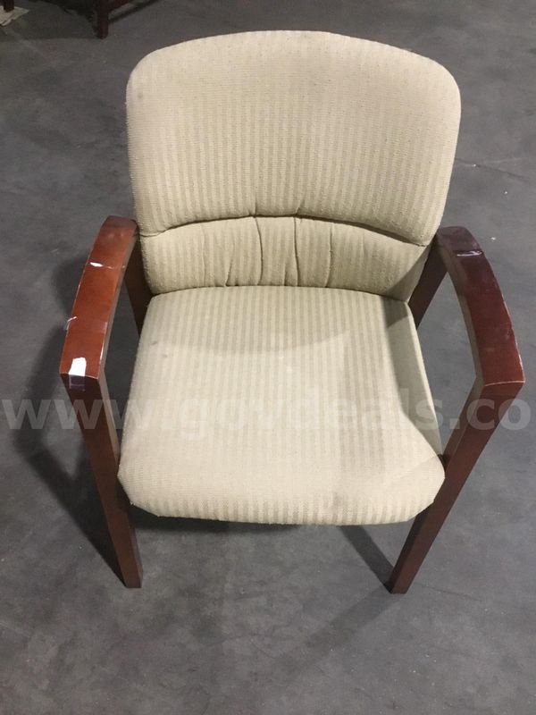 Light tan chair; with dark brown mahogany hardwood armrests "DH"