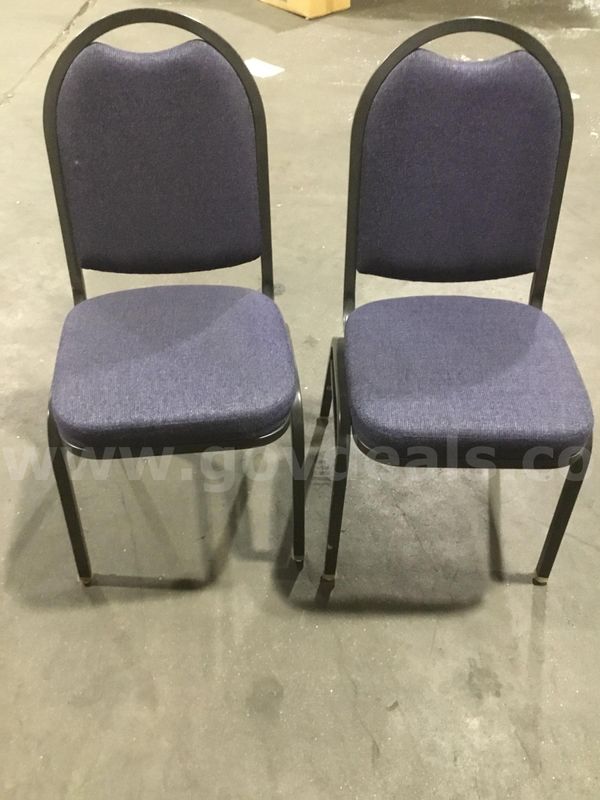 2 navy blue armless stacking chairs "DH"