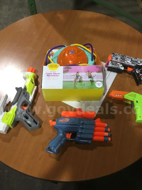 Lot of items-Spinning sprinkler, misc toy guns "DH"