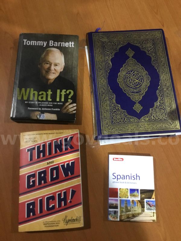 What If" book, "Think And Grow Rich" book, Spanish dictionary "DH"