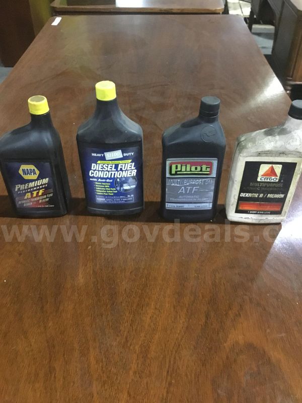 Lot of items-Premium, Diesel fuel, pilot, & multipurpose oil bottles "DH"