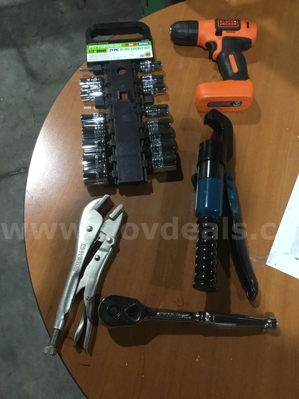 Lot of items-clamp tool, hydraulic crimping tool, socket set, orange & black drill gun; with a battery "DH"