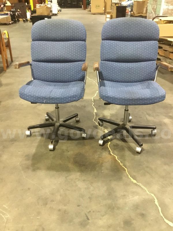 2 blues chairs; with light brown hardwood armrests "DH"