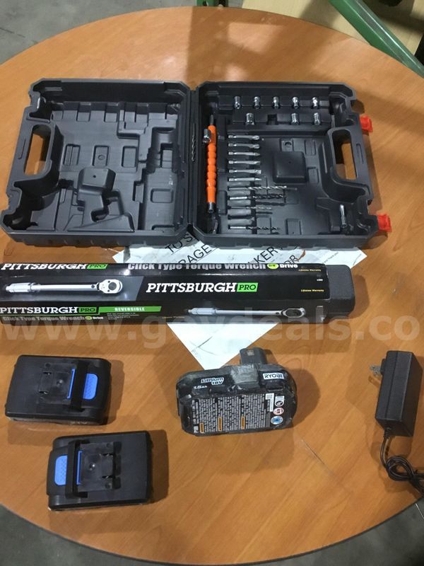 Lot of items-torque wrench, battery packs, & a drill bit set "DH"