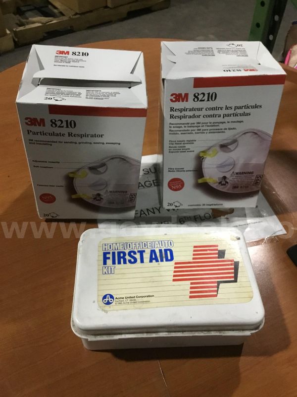 2 boxes of respirator masks, & a first aid kit "DH"