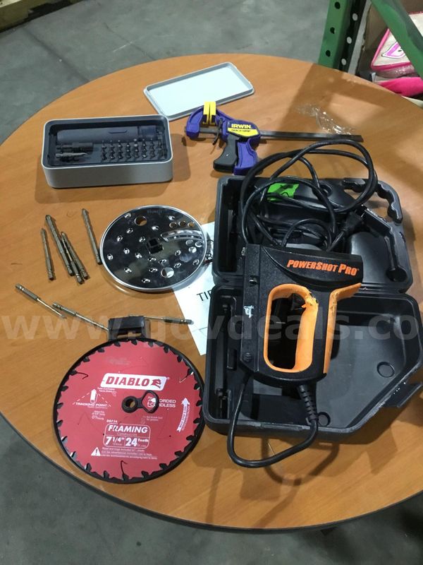 Lot of items-nail gun (IT TURNS ON), diamond cut blade, bar clamp tool, drill bits kit "DH"