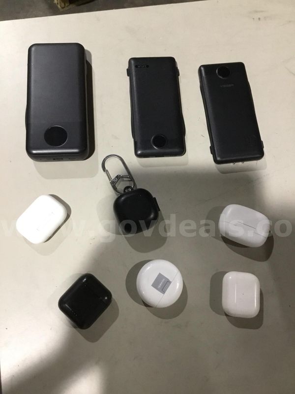 Lot of electronics-4 white earbuds "DH"