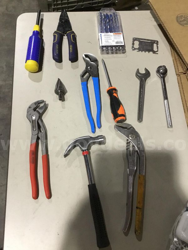 Lot of items-silver pipe wrench pliers; with yellow padding "DH"