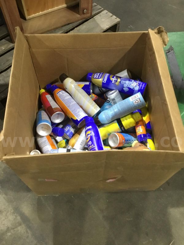 Box of misc bottles-sunscreen spray "DH"