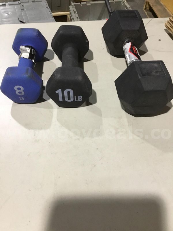 Lot of items-a blue 8d dumbbell, 10 pd black dumbbell, & a 20 pd black dumbbell "DH"
