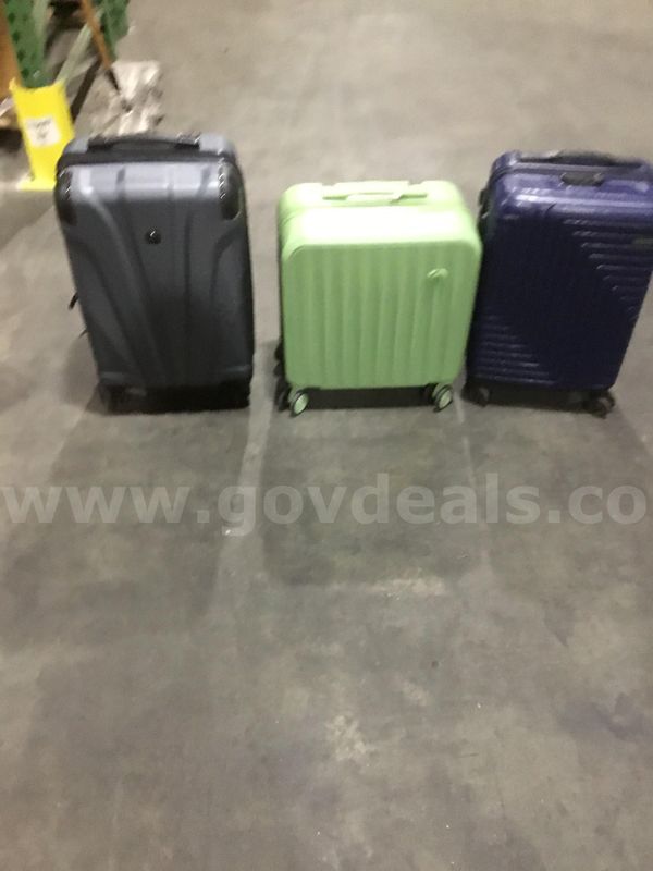 Lime green, dark blue, & a dark gray luggage bags "DH"