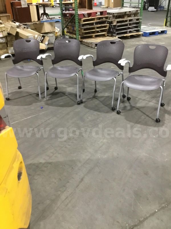 4 chairs; with light gray armrests "DH"