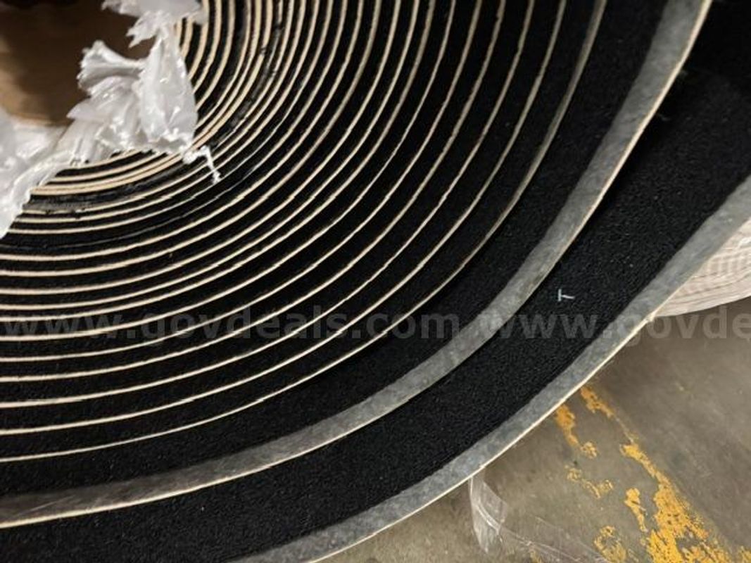 5 rolls of black carpet