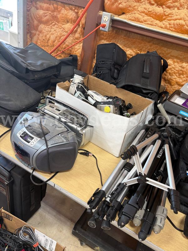 (1) Assorted Lot of Video Cameras, Cameras, Cables, Carrying Cases, & (5) Tripods