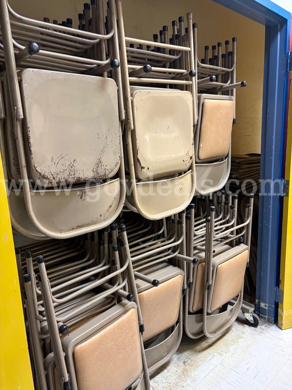 A Large Lot of Metal Folding Chairs (Quantity Unknown)