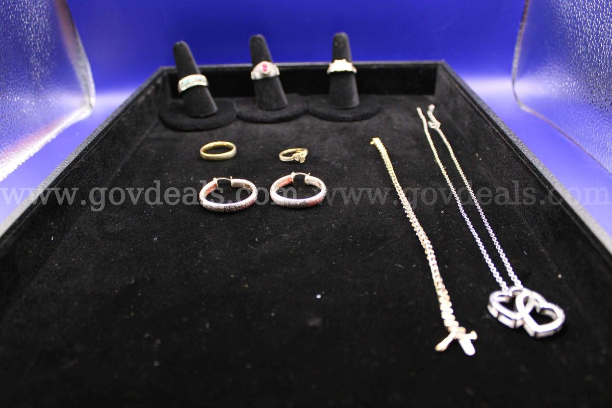 RING (5); NECKLACE (1); BRACELET (1); EARRING, PAIR (1)