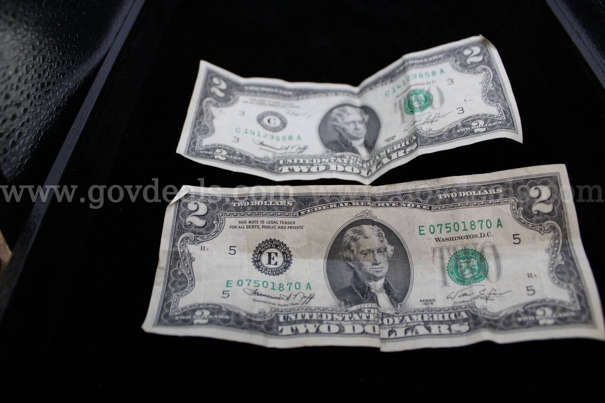 $2.00 BILL (2), $1.00 COIN (7), $0.01 COIN (10), 0.02 COIN (2), 0.10 COIN (3), 0